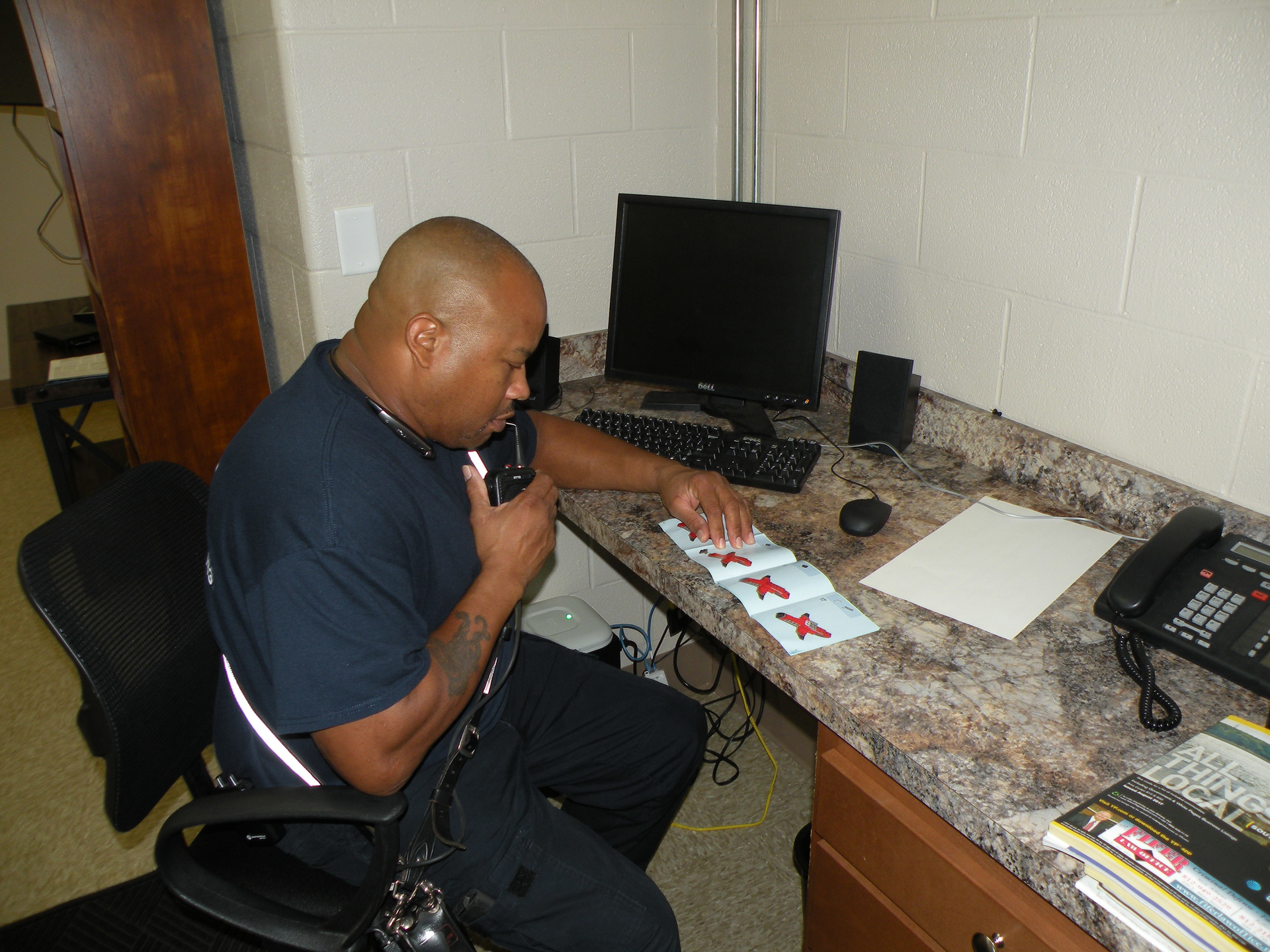 Lego drill: The model boss, stationed in a separate room, gives instructions to the model-makers as to how to construct the set.