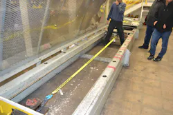 A ratchet unit with 2-inch-wide webbing is placed in a test bed and prepared for the Standard Hand Force test. Photos by Ron Moore A ratchet unit with 2-inch-wide webbing is placed in a test bed and prepared for the Standard Hand Force test. Photos by Ron Moore