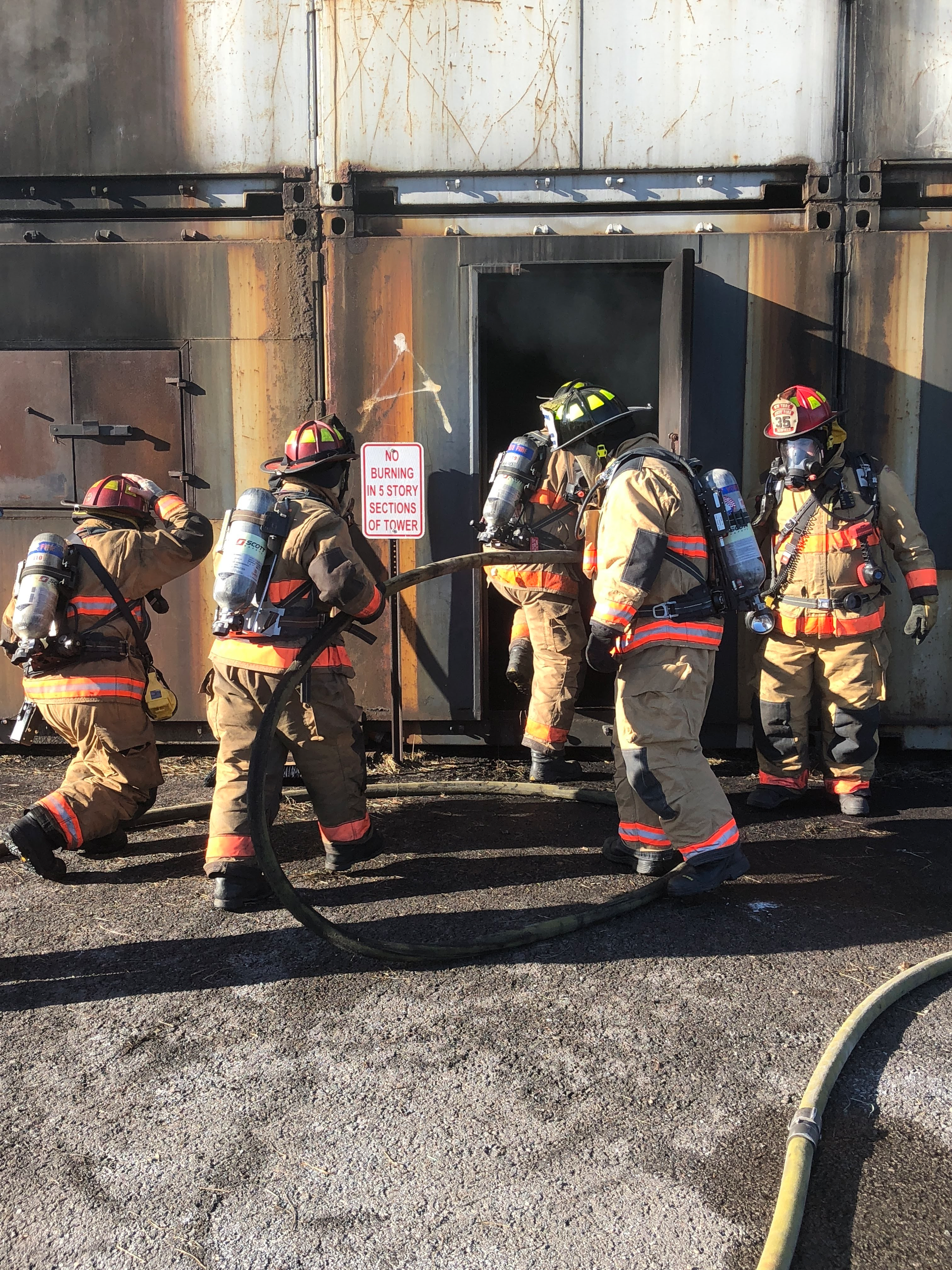 Experiments were conducted with c-Air during several structural burns with the objective of monitoring particulate matter distribution and morphology during an extended post-suppression period.