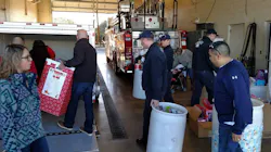 Lubbock firefighters during a Christmas toy drive in 2015. Lubbock firefighters during a Christmas toy drive in 2015.