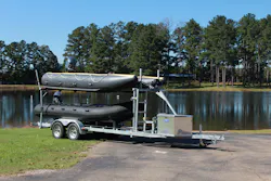 An example of a double-stacked trailer with both military-style and pontoon-style rescue boats for various mission types. An example of a double-stacked trailer with both military-style and pontoon-style rescue boats for various mission types.
