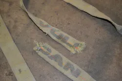The 2-inch-wide webbing failed at just over 50 percent of its ultimate breaking strength during the destructive testing—exactly at the spot where the seemingly minor abrasions were on the webbing. The 2-inch-wide webbing failed at just over 50 percent of its ultimate breaking strength during the destructive testing—exactly at the spot where the seemingly minor abrasions were on the webbing.