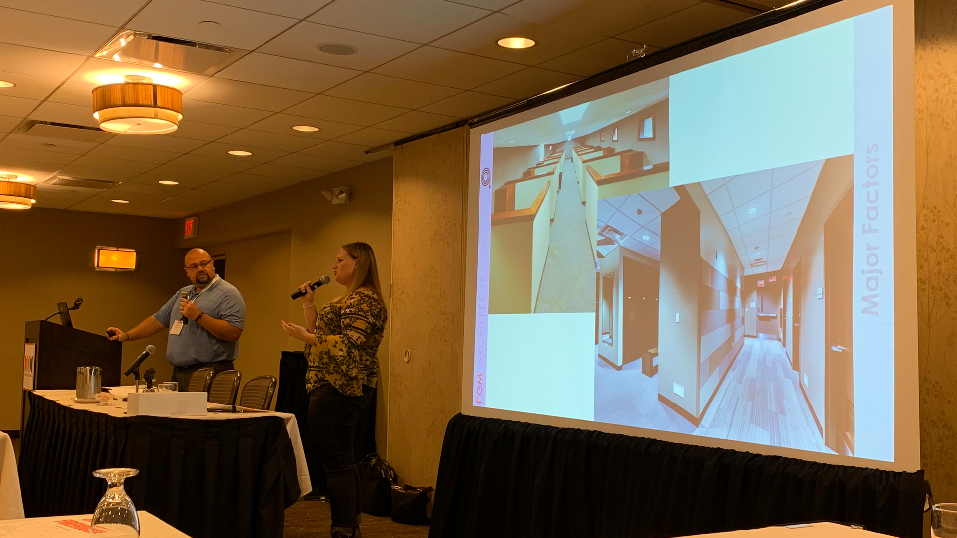 Jason Estes and Raegan Porter of FGM Architects discuss how to break down the budgets for new fire and police station construction projects during a session Wednesday at the 2019 Station Design Conference in Rosemont, IL.