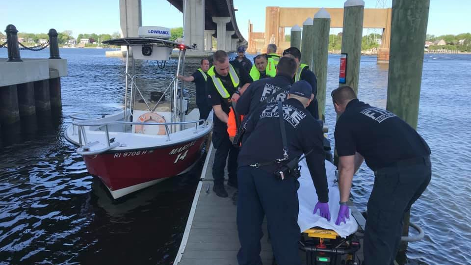 Three boaters were rescued from cold water Wednesday by Tiverton, MA, firefighters after choppy waves capsized their powerboat.
