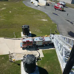 A bird's-eye view from the top of the extended ladder of Lincoln City, IL, Fire Department's new aerial apparatus. A bird's-eye view from the top of the extended ladder of Lincoln City, IL, Fire Department's new aerial apparatus.