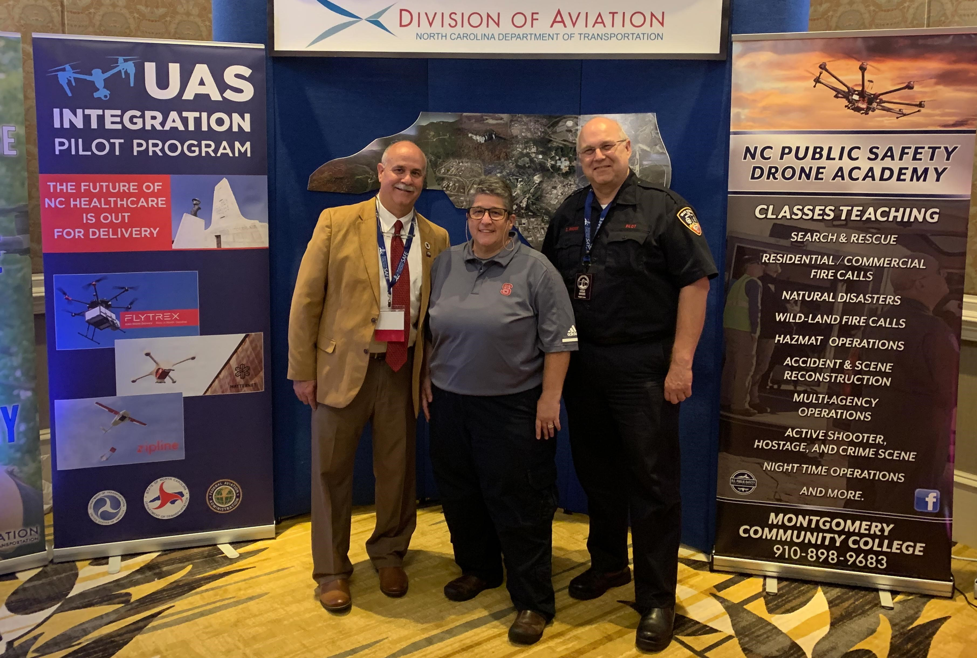 DRONERESPONDERS Director Charles Werner shares a moment with DRONERESPONDERS Advisors Justin Hollingshead and Steve Rhode at the North Carolina Drone Summit on April 12, 2019.