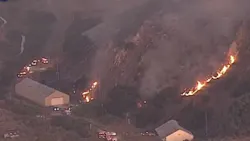 Firefighters from multiple agencies battled a five-alarm grass fire that threatened an historic Mare Island, CA, cemetery Thursday. Firefighters from multiple agencies battled a five-alarm grass fire that threatened an historic Mare Island, CA, cemetery Thursday.