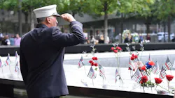 A firefighter salutes the fallen at the 9/11 Memorial in lower Manhattan on Wednesday, Sept. 11, 2019. A firefighter salutes the fallen at the 9/11 Memorial in lower Manhattan on Wednesday, Sept. 11, 2019.