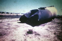 Portion of phosphorus tank car propelled by the force of the steam explosion inside the car. (Courtesy Sidney, NE, Fire Department). Portion of phosphorus tank car propelled by the force of the steam explosion inside the car. (Courtesy Sidney, NE, Fire Department).