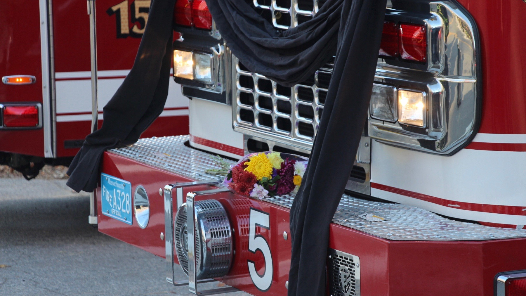 A procession passed the McKeon Road Fire Station, where fallen Worcester, MA, Lt. Jason Menard was assigned to Ladder 5, Group 2, on its way to Mercadante Funeral Home.