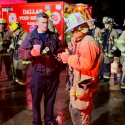 Dallas Assistant Chief Justin Ball (left) and Operations Chief Charlie Salazar at the scene of damage following a tornado that touched down in the Dallas-Fort Worth area Oct. 20, 2019. Dallas Assistant Chief Justin Ball (left) and Operations Chief Charlie Salazar at the scene of damage following a tornado that touched down in the Dallas-Fort Worth area Oct. 20, 2019.