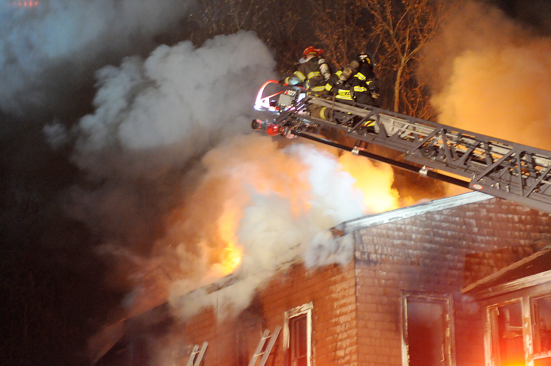 Firefighters began searching the home for a squatter who was reported to live inside, but were forced out by advanced fire conditions.