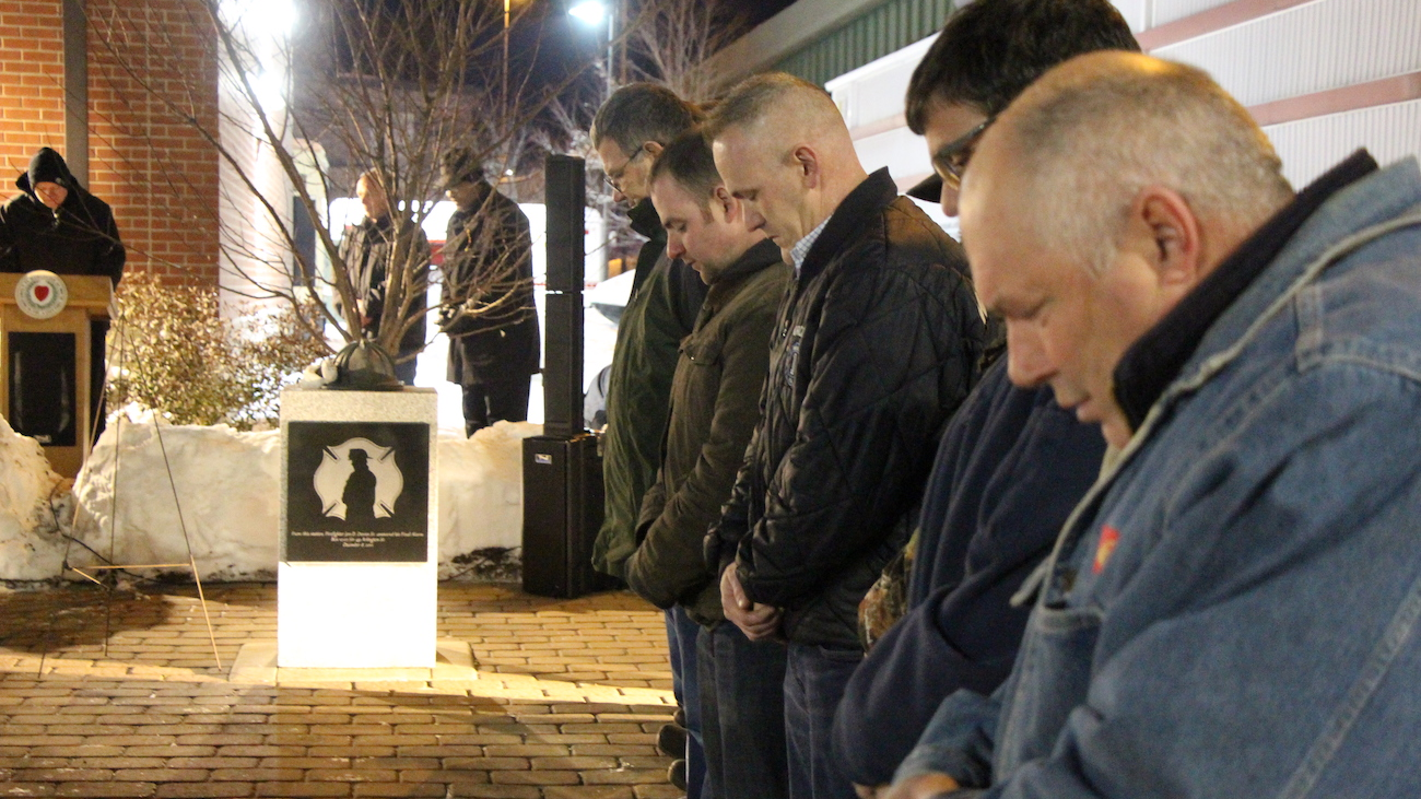 Members of Worcester, MA, Fire Department's Rescue 1 honor fallen firefighter Jon Davies Sr. during a ceremony Sunday that marked the anniversary of his death, which was Dec. 8, 2011.