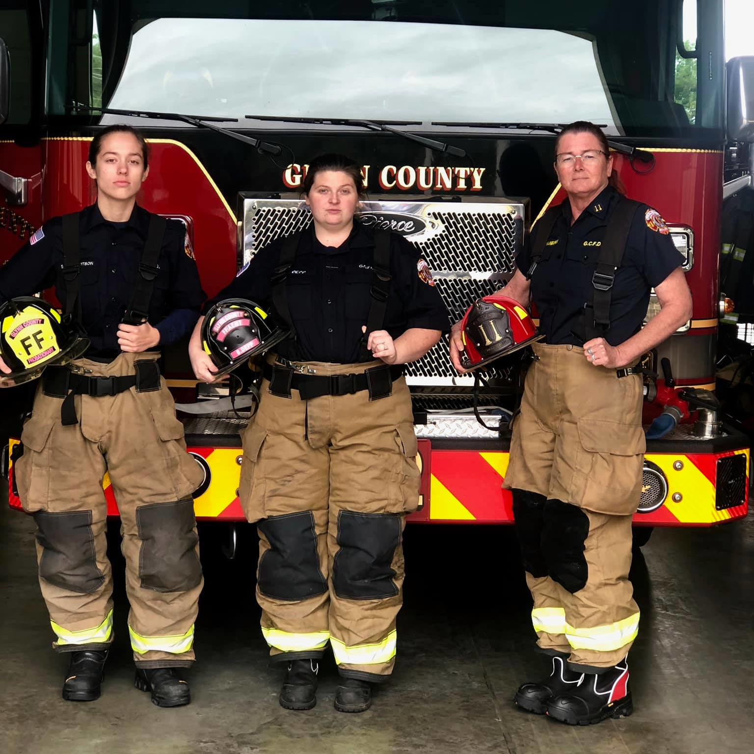 Capt. Elizabeth Hawkins (right) leads Glynn County, GA, Fire Rescue Department's all-female fire engine crew, which includes firefighter/EMTs Syndal Tillotson (left) and Brianna Depp.