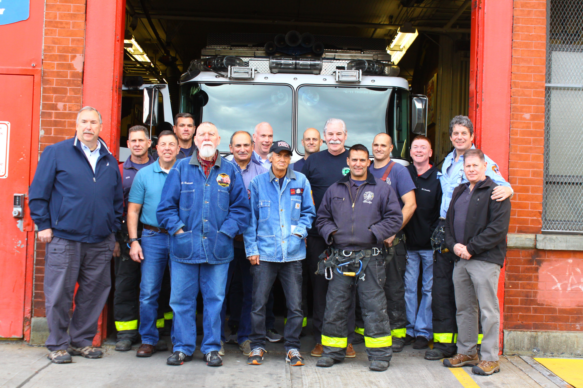 Current and former Rescue 2 firefighters during the 'Last Tour' at the Brooklyn fire station on Nov. 3, 2019. On the right is Chicago Battalion Chief Pat Maloney and Rescue 2 Capt. Liam Flaherty.