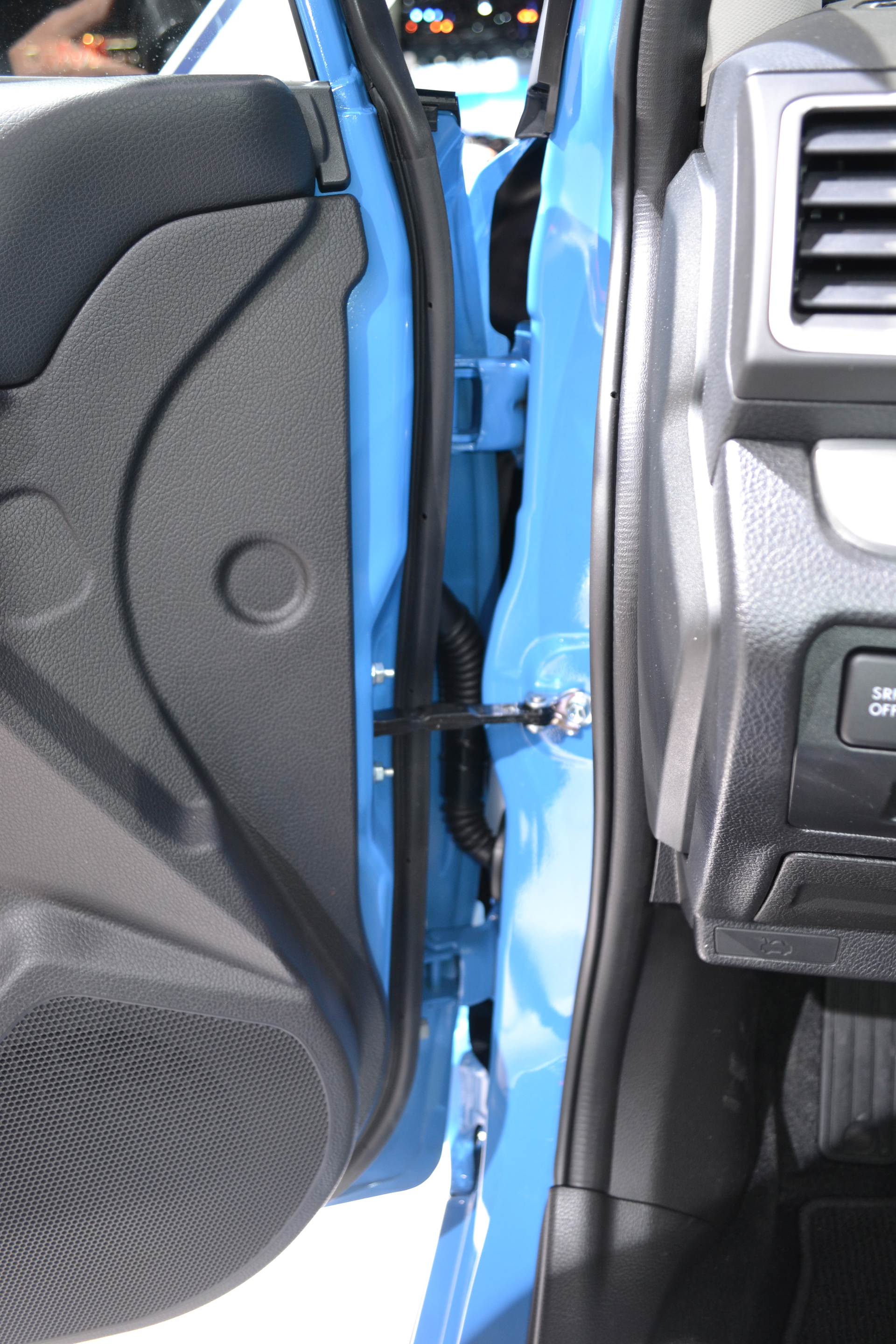 The front door of a 2020 Subaru CrossTrek has&mdash;as is the case on the doors of most new automobiles&mdash;four points of attachment to the vehicle: two hinges, a wiring harness and a door-retainer bar.