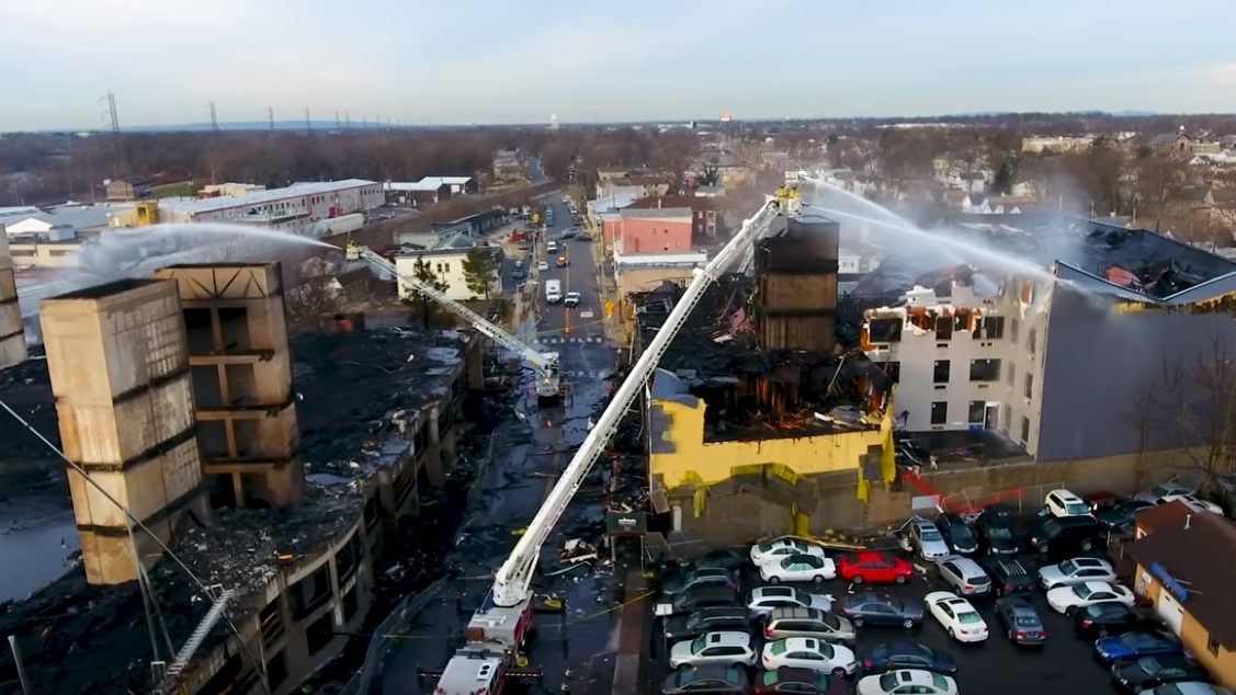 Drone footage shows the destruction caused by a seven-alarm blaze that broke out in under-construction buildings in Bound Brook late Sunday.
