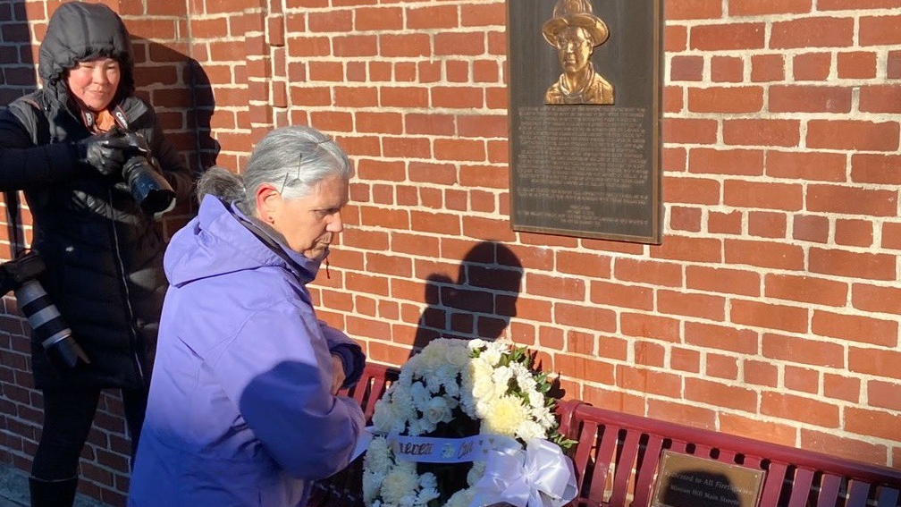 Flowers were laid Thursday at the memorial for Boston firefighter Kevin Kelley, who was killed in a fatal aerial crash in 2009.