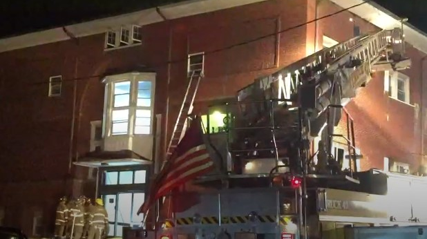 Five firefighters were injured following an explosion while battling a three-alarm blaze at a Red Lion, PA, apartment building Saturday.