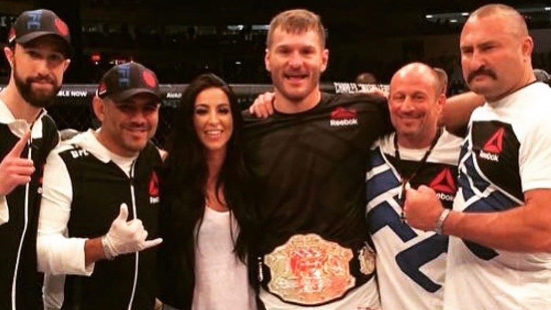 UFC heavyweight champion Stipe Miocic (center) is helping during the coronavirus pandemic as a Valley View, OH, firefighter.