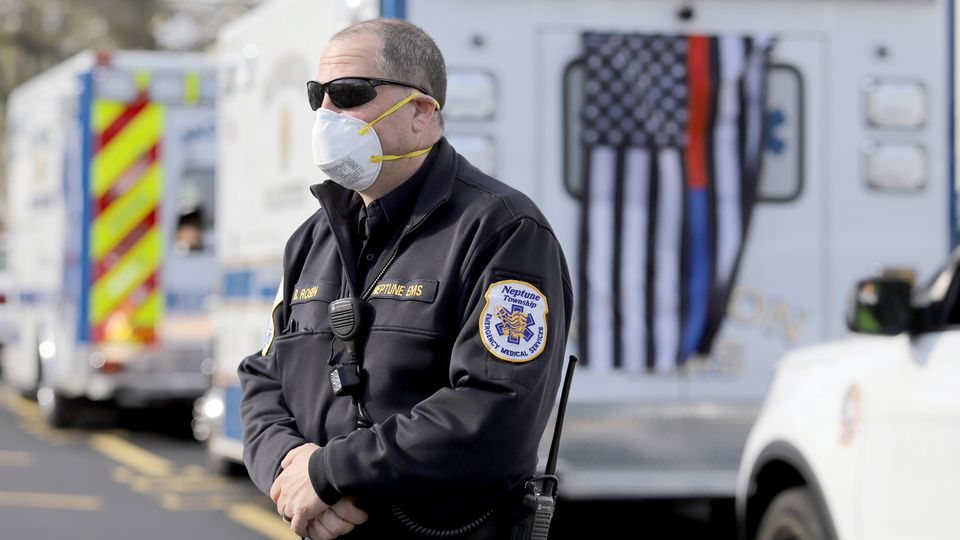 Bil Rosen, chief of Neptune, NJ, EMS, before the start of a memorial drive-by for Robert Weber. He was an active member of the Middletown Township First Aid & Rescue Squad and died from COVID-19.