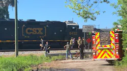 Ocala, FL, firefighters rescued a person who was struck by and pinned underneath a train Monday. Ocala, FL, firefighters rescued a person who was struck by and pinned underneath a train Monday.