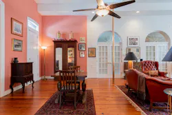 The first-floor living room is 45 feet long and features a 16-foot ceiling. The first-floor living room is 45 feet long and features a 16-foot ceiling.