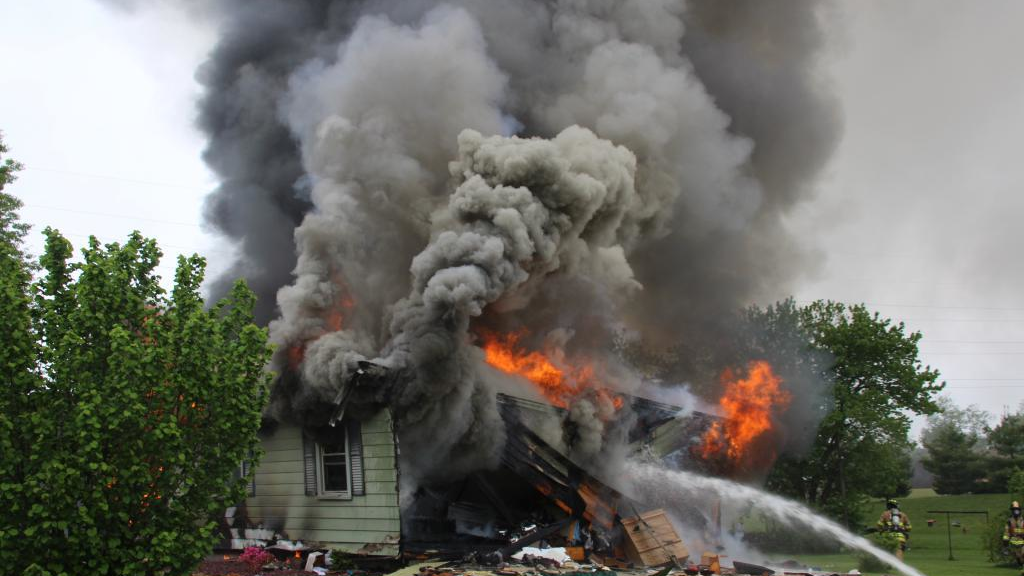 Crews from four fire departments responded to a fiery residential explosion in Berlin, CT, on Monday that injured at least one person.
