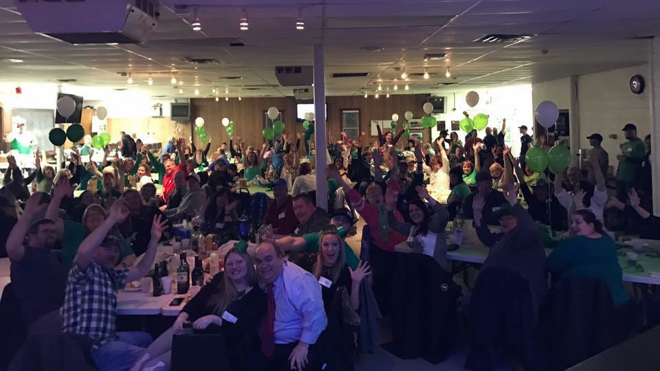 Supporters of the Sutersville VFD wave to the camera during one of the department's operational fundraisers in 2017.