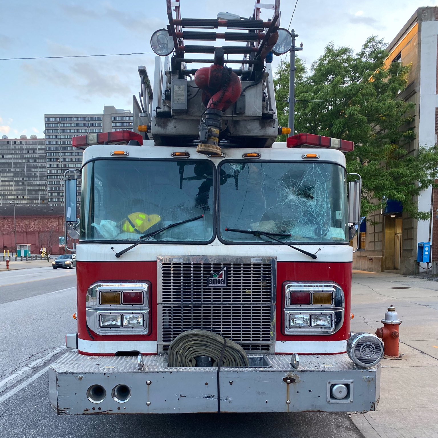 Cleveland Fire Department's Ladder 23 was placed out of service after bottles and rocks were thrown at it during protests Saturday, smashing the vehicle's windshield.