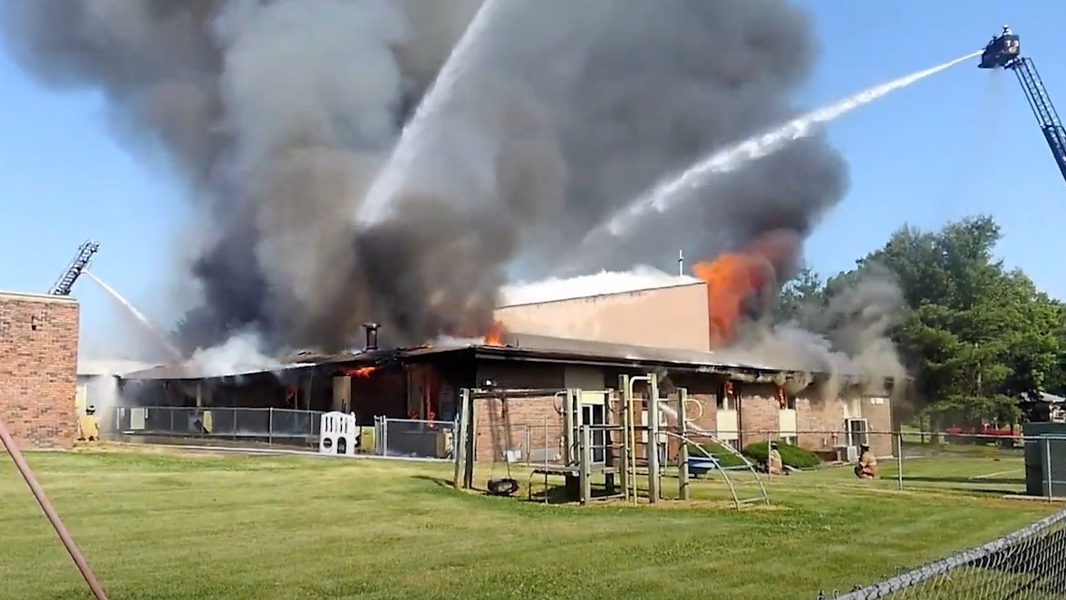 Firefighters from more than a dozen departments battled a blaze that broke out at a Clinton, IL, church Tuesday.