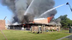 Firefighters from more than a dozen departments battled a blaze that broke out at a Clinton, IL, church Tuesday. Firefighters from more than a dozen departments battled a blaze that broke out at a Clinton, IL, church Tuesday.