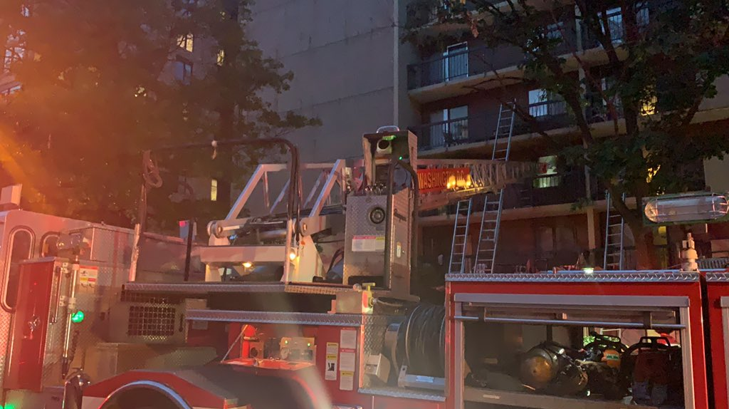Firefighters rescued apartment residents from their balconies during a two-alarm blaze in Washington, D.C., on Friday night.