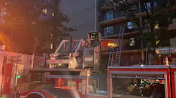 Firefighters rescued apartment residents from their balconies during a two-alarm blaze in Washington, D.C., on Friday night. Firefighters rescued apartment residents from their balconies during a two-alarm blaze in Washington, D.C., on Friday night.