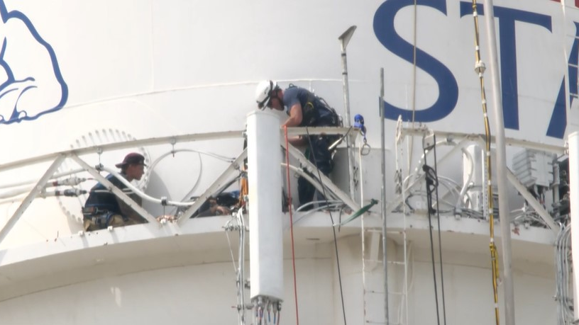 Fresno, CA, firefighters rescued a worker who became unconscious from apparent heat exhaustion atop the Fresno State University water tower.