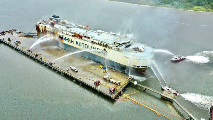 Jacksonville, FL, fire boats and firefighters sprayed the ship's hull to keep it cool and intact as the blaze on board slowly burnt out.
