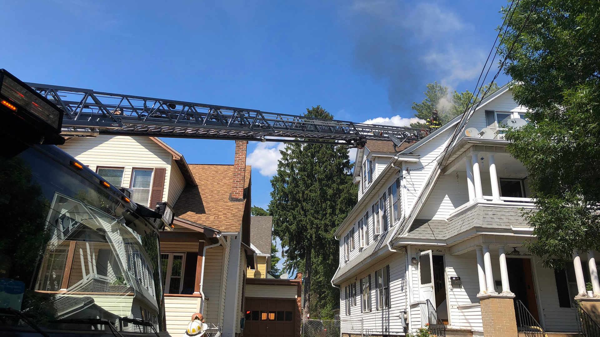 Two Springfield, MA, firefighters were burned while ventilating a burning three-story house Monday.