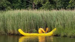 Centerville-Osterville-Marstons Mills firefighters deployed an inflatable 'banana boat' to rescue a woman stuck in mud and weeds at the end of the Herring River in Centerville on Wednesday. Centerville-Osterville-Marstons Mills firefighters deployed an inflatable 'banana boat' to rescue a woman stuck in mud and weeds at the end of the Herring River in Centerville on Wednesday.