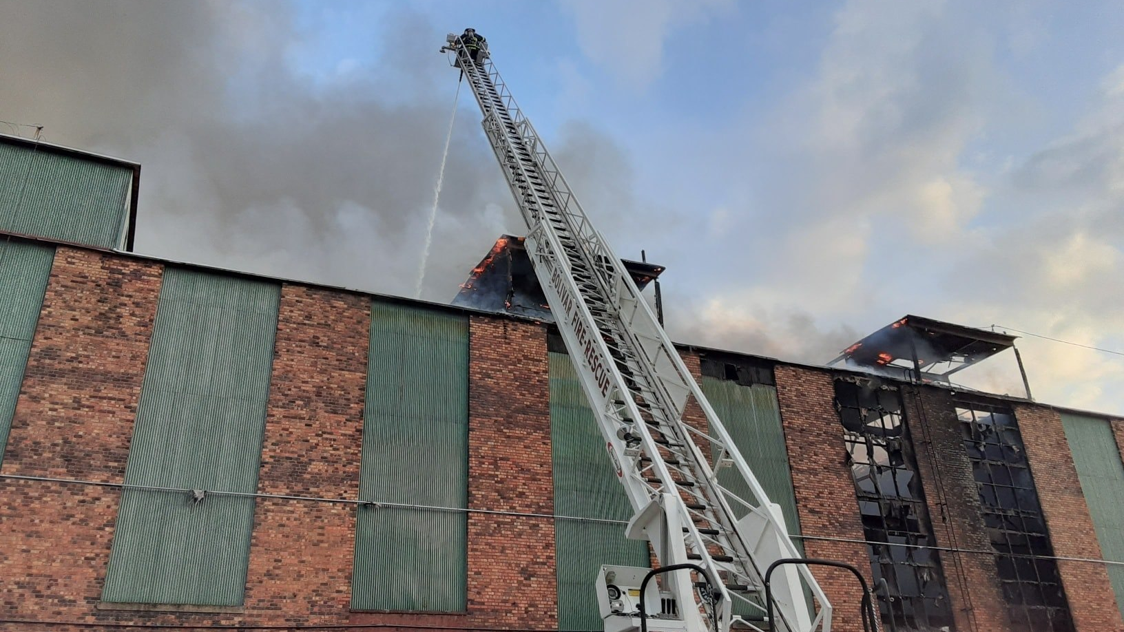 Firefighters from two dozen departments battled a blaze that broke out at a nearly 100-year-old railway in Benton, OH, on Thursday.