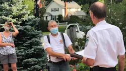 A ceremony was held for volunteer firefighter Mike Croteau (center) on Aug. 3 to celebrate his retirement after 75 years with Newbury, NH, Fire Rescue. A ceremony was held for volunteer firefighter Mike Croteau (center) on Aug. 3 to celebrate his retirement after 75 years with Newbury, NH, Fire Rescue.
