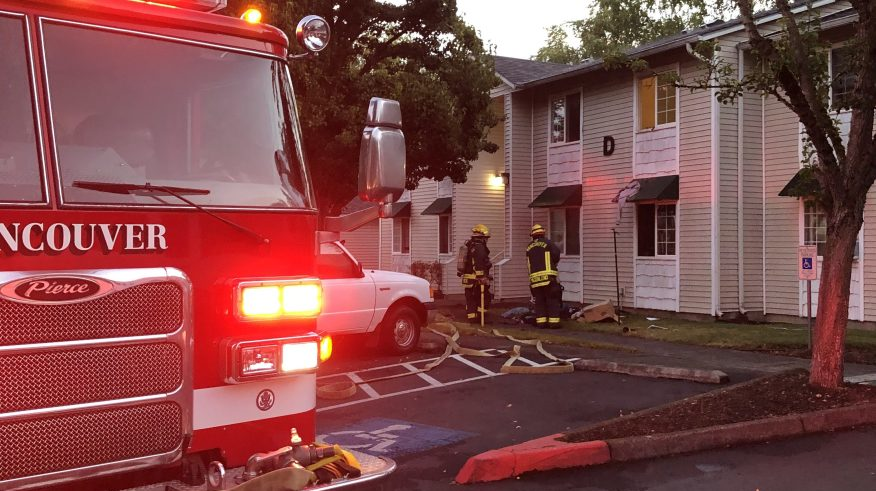 A resident used a fire extinguisher to keep an apartment blaze from spreading until Vancover, WA, firefighters arrived at the scene Saturday.