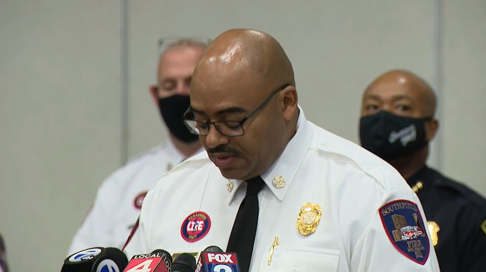 Southfield, MI, Fire Chief Johnny Menifee struggles to contain his emotions as he speaks during a press conference on Aug. 27, 2020.