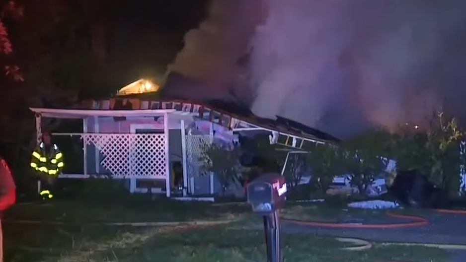 Crews from multiple fire departments battled a blaze that erupted after a house explosion in Commerce Township early Thursday.