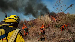 Inmate firefighters clear brush as they work to slow down the spread of the Maria Fire on the Santa Clara river bed, in Santa Paula, CA, on Nov. 1, 2019. Inmate firefighters clear brush as they work to slow down the spread of the Maria Fire on the Santa Clara river bed, in Santa Paula, CA, on Nov. 1, 2019.