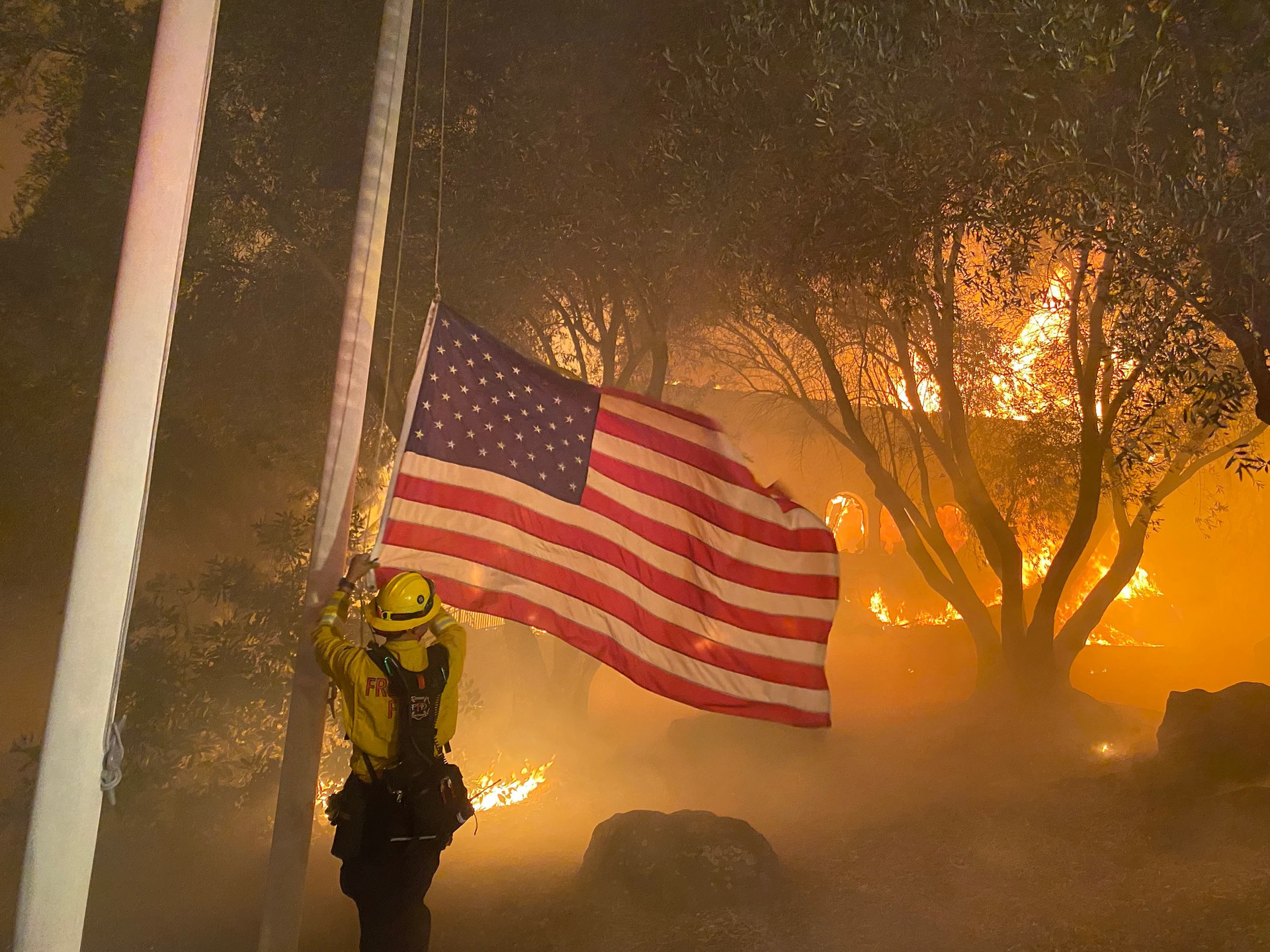 Fremont, CA, firefighters rescued a flag threatened by the Glass Fire at the Fairwinds Estate Winery in Calistoga this week.