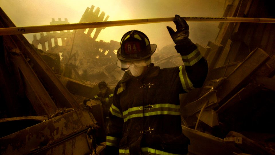 FDNY firefighters search through the rubble of the south tower of the World Trade Center in New York City on Sept. 11, 2001.