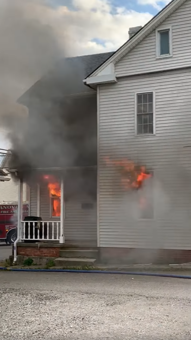 A Hanover, PA, firefighter suffered burns battling a house fire Wednesday.
