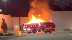 Hernando County, FL, firefighters worked to put out a blaze that ignited with a tractor-trailer before spreading to two other semis near a Brooksville Walmart on Friday. Hernando County, FL, firefighters worked to put out a blaze that ignited with a tractor-trailer before spreading to two other semis near a Brooksville Walmart on Friday.