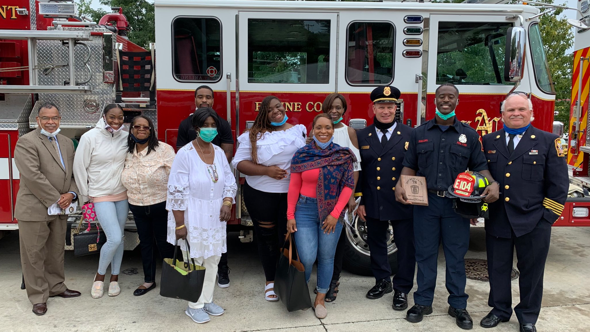 Anthony Phillips Jr. (second from right) graduated from with Arlington, VA, Fire Department Recruit Class 76.