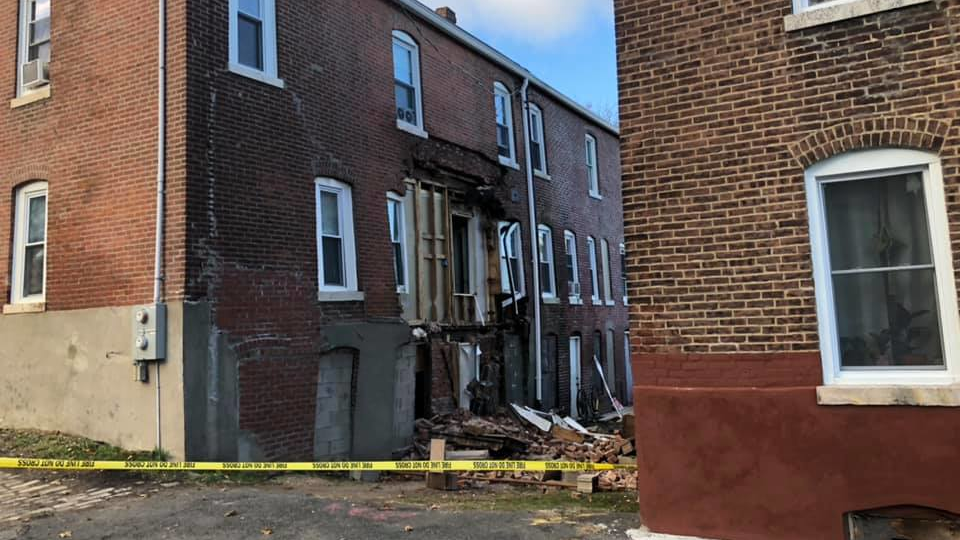 Holyoke, MA, firefighters and police evacuated four units in an apartment building Sunday as the rear wall collapsed.